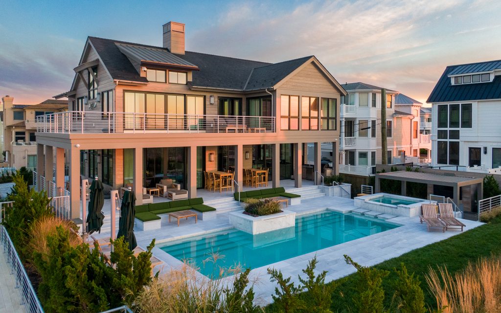 Coastal outdoor living space with lighting, audio, security, networking, and smart home integration