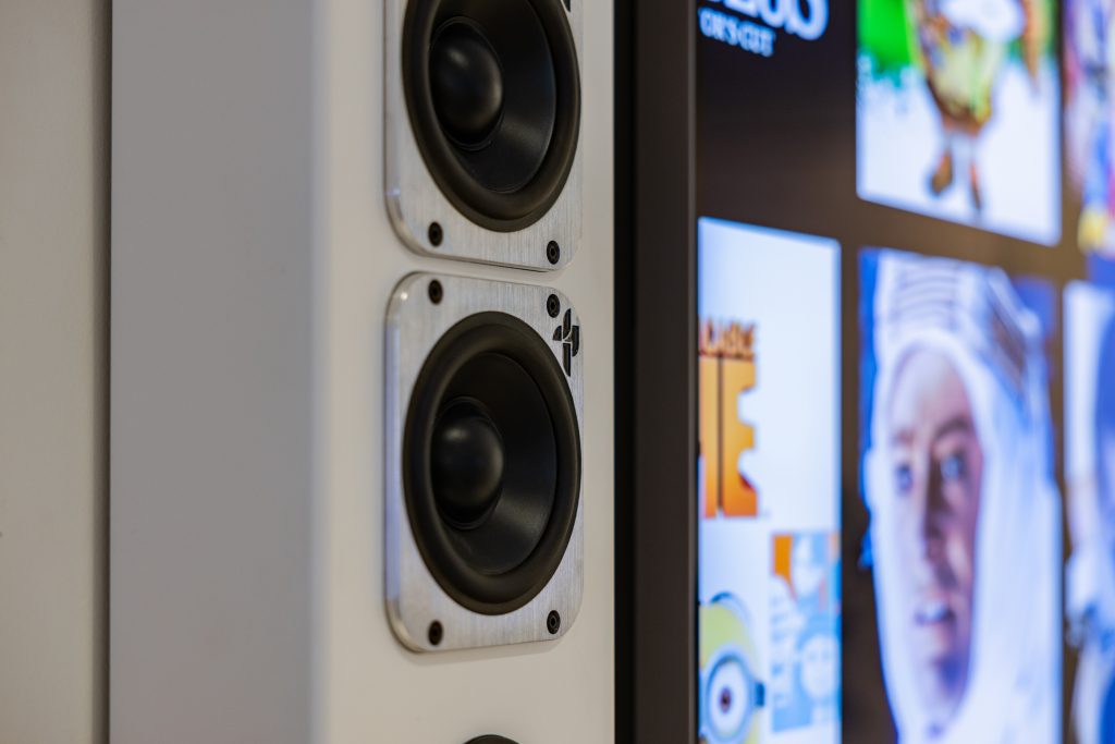 On-wall speakers for a clean media-room installation