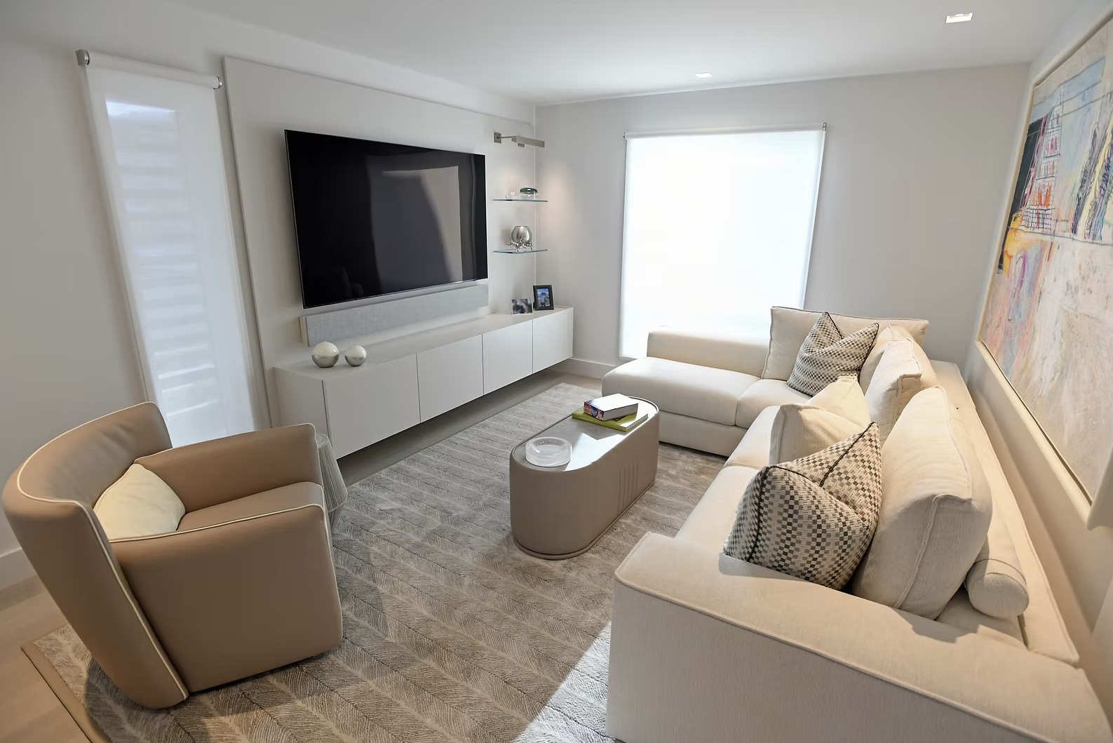 Media Room with Sound by LEON and Lights and Shades by Lutron