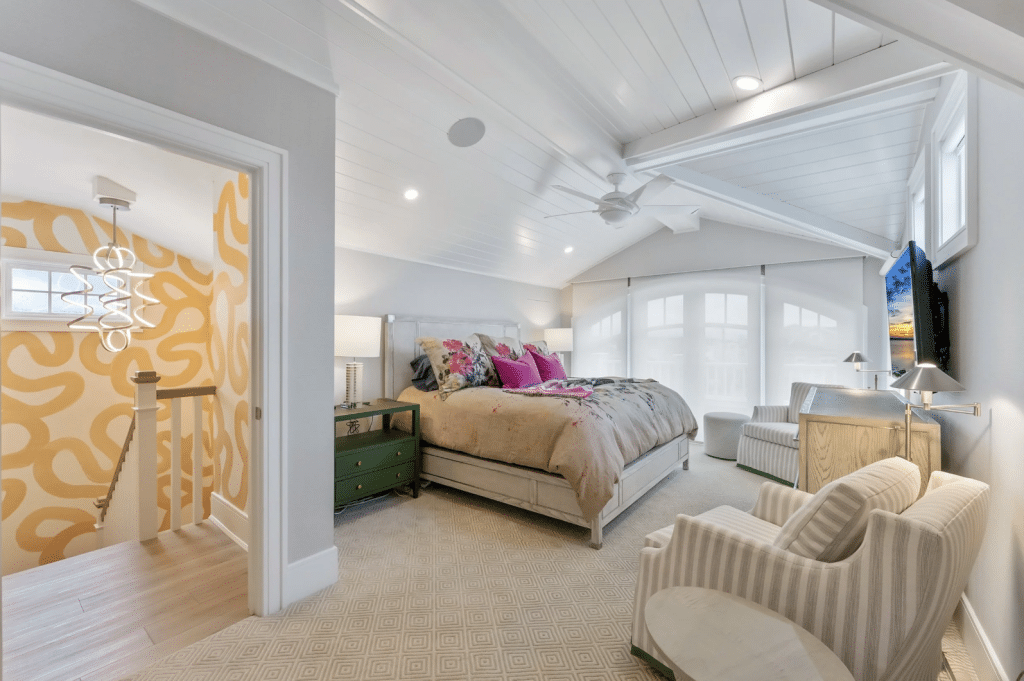 Design-sensitive bedroom technology planning with lighting shades and ceiling fan integration