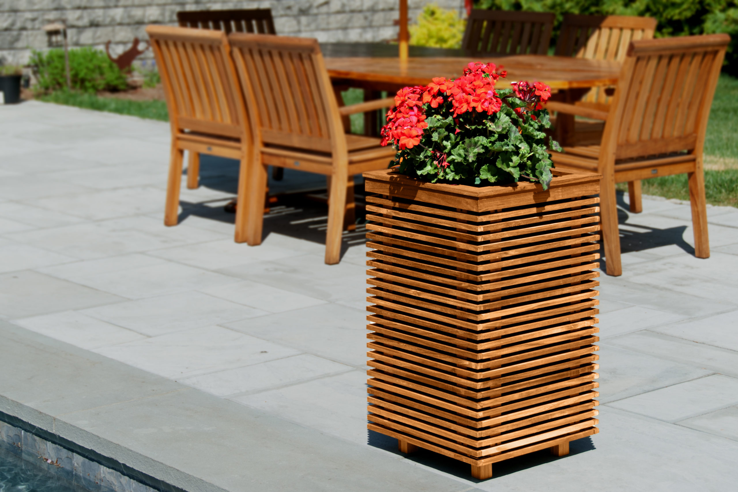 Planter-style speakers for patios pools and gardens
