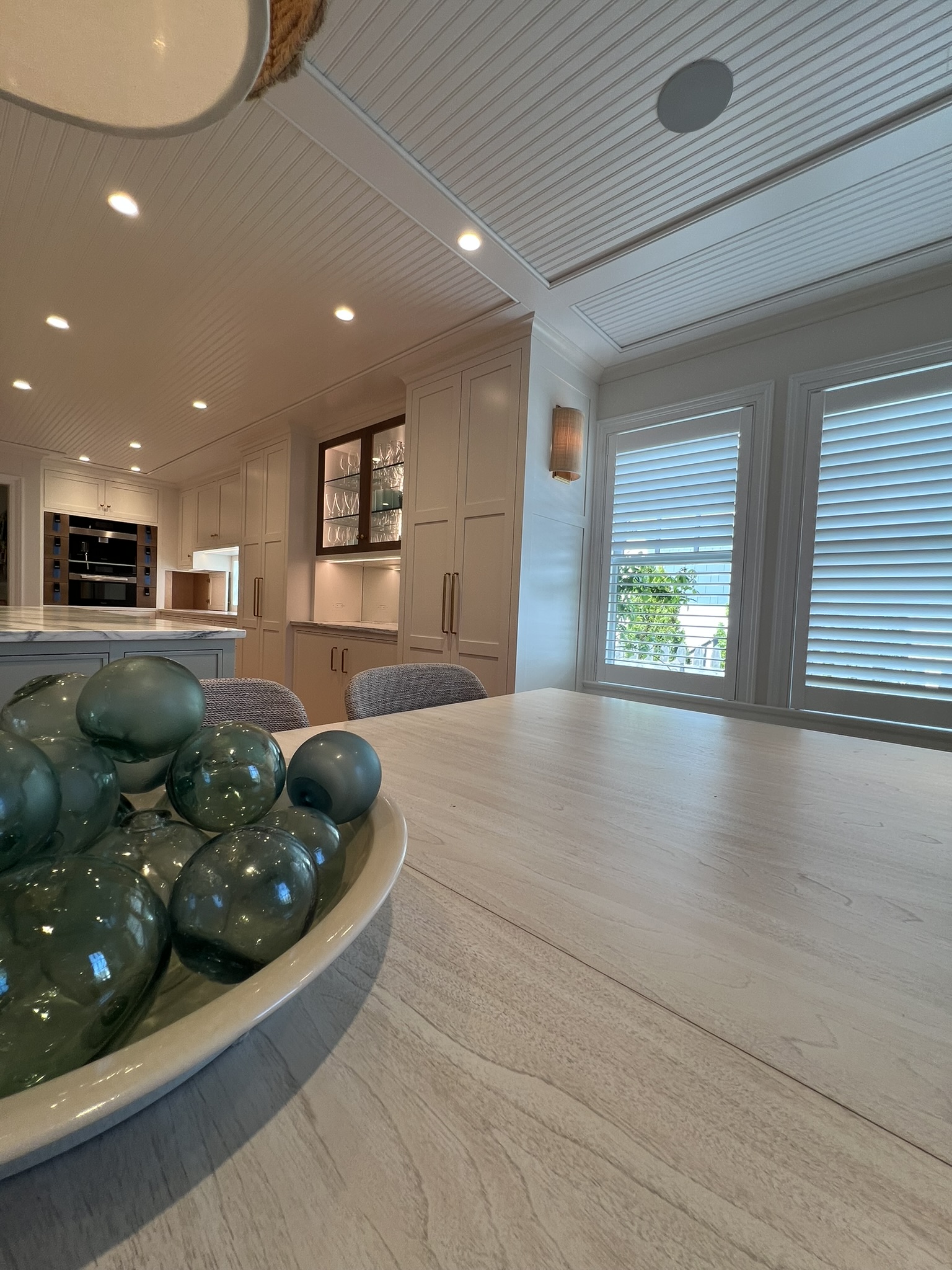 Completed Lutron Lumaris lighting in the renovated Stone Harbor kitchen and dining area