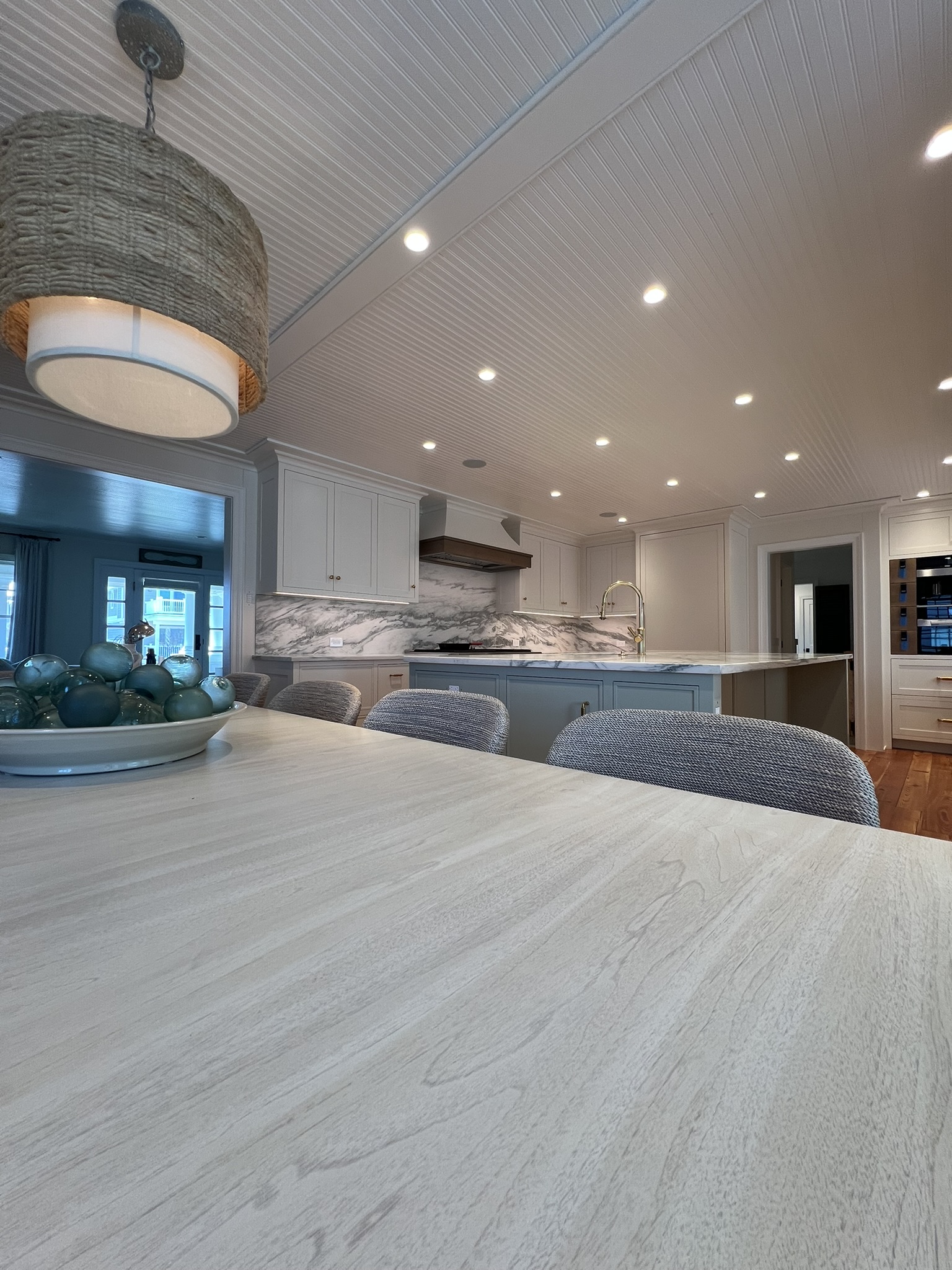 Lutron Lumaris recessed lighting illuminating a renovated Stone Harbor kitchen and dining space