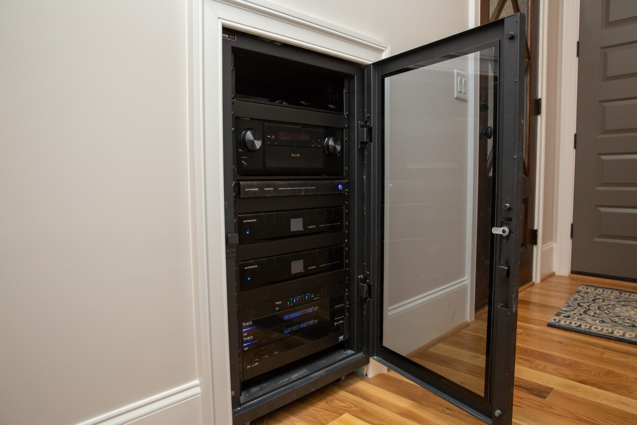 Smart home equipment rack supporting networking, control, audio, and video systems in a South Jersey home