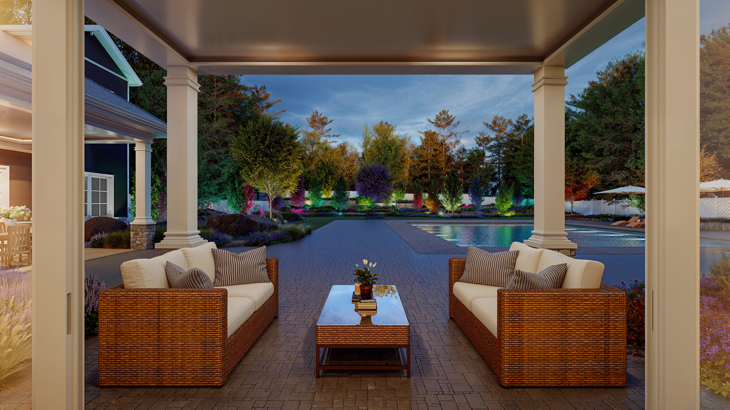 Coastal Source VIA outdoor lighting with Lutron Ketra color illuminating trees and landscape